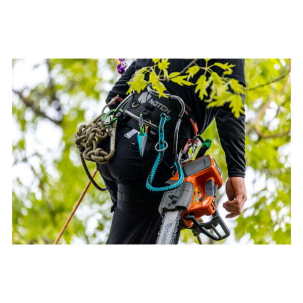 Notch Quick Cinch Chainsaw Lanyard teal and black with silver ring in use on an arborist climbing a tree