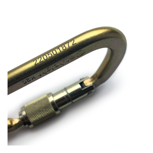 Gold carabiner with serial number standing on side with screw gate closing